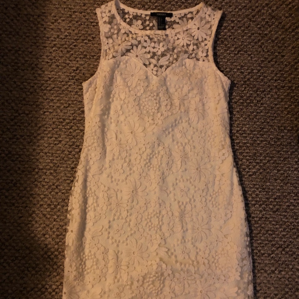Cream body hugging lace dress